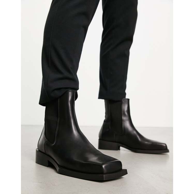 ASOS DESIGN chelsea boot in black leather with angled sole