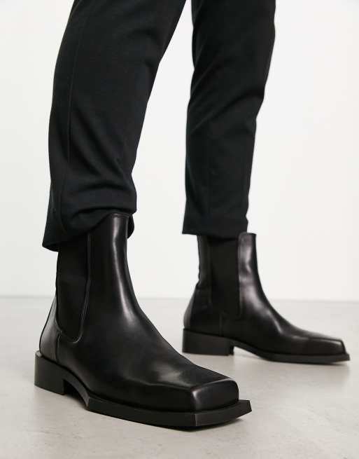 ASOS DESIGN chelsea boot in black leather with angled sole | ASOS