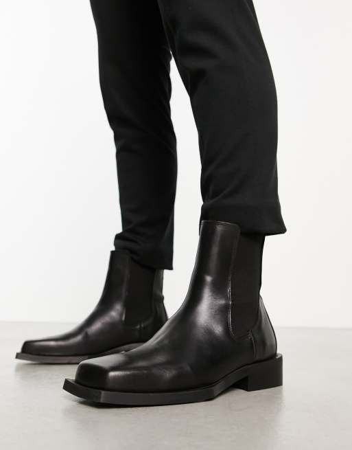 ASOS DESIGN chelsea boot in black leather with angled sole