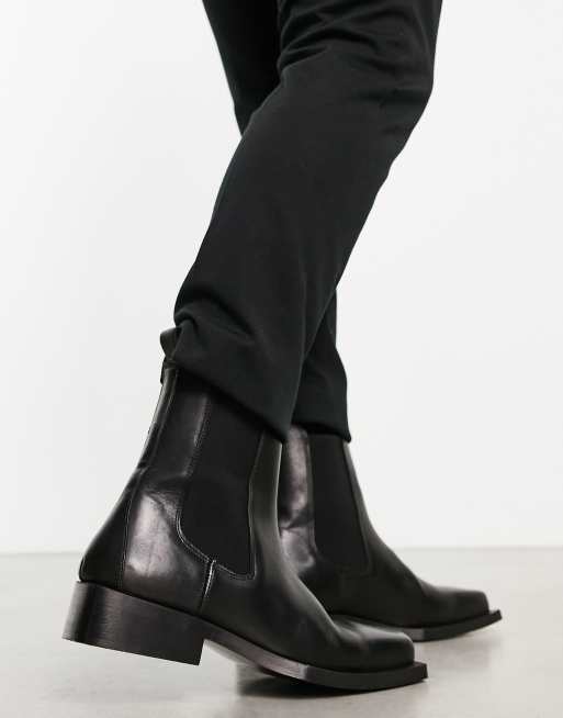 ASOS DESIGN chelsea boot in black leather with angled sole