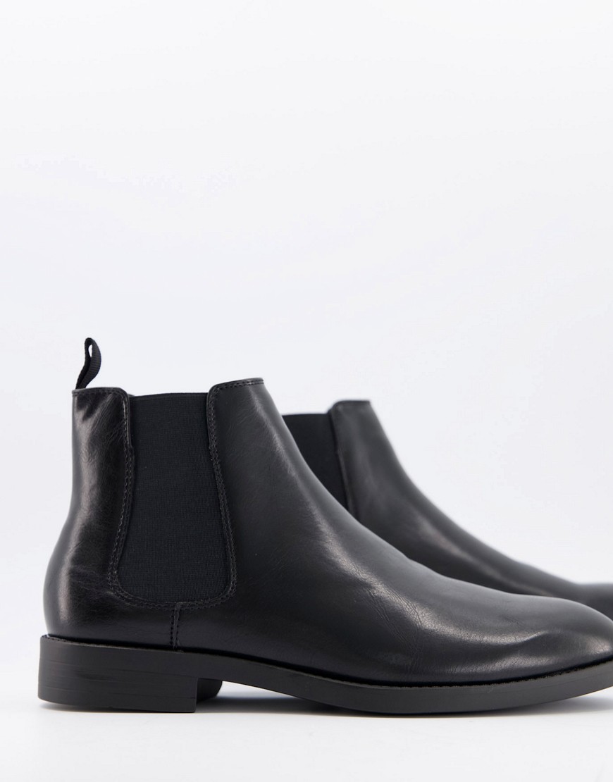 ASOS DESIGN chelsea boots in black faux leather with black sole