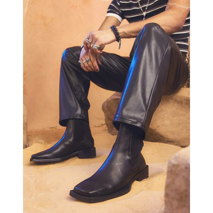 DESIGN Chelsea boots in black leather angled sole | ASOS