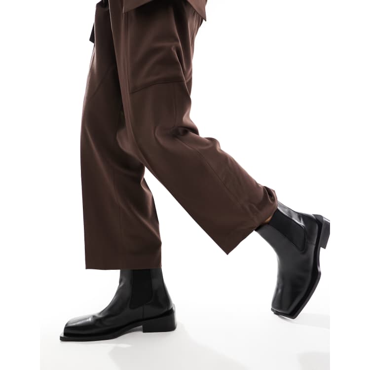 ASOS DESIGN Chelsea boots in black leather with angled sole