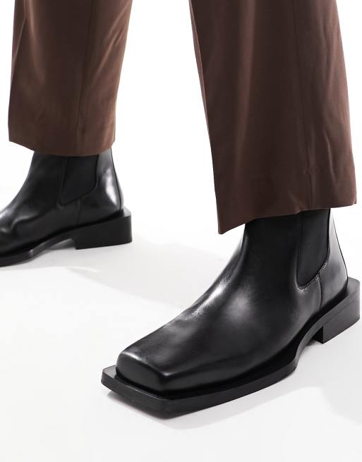 ASOS DESIGN Chelsea boots in black leather with angled sole