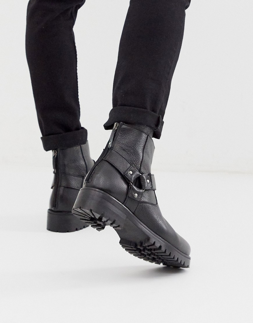 ASOS DESIGN chelsea boots in black tumbled leather with chunky sole and strapping detail