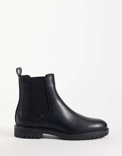 ASOS DESIGN chelsea boots with cleated sole in black - view 1