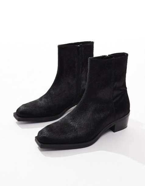 ASOS DESIGN – Chelsea-Stiefel in schwarzer Kuhfelloptik mit kubanischem Absatz - view 1