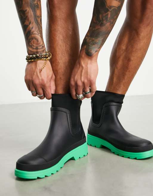 ASOS DESIGN chelsea wellington boot in black with green contrast