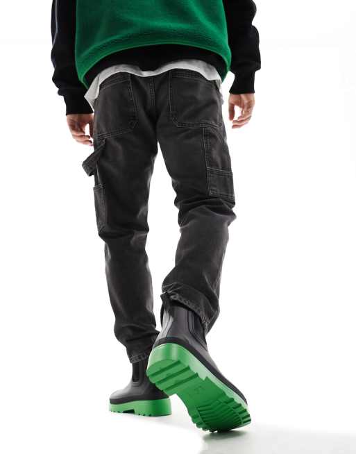 ASOS DESIGN chelsea wellington boots in black with green contrast sole, 2 of 4