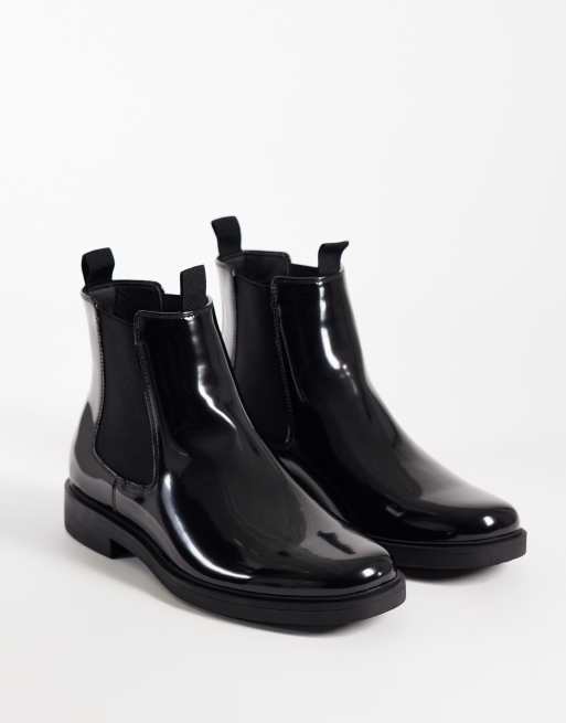 ASOS DESIGN chelseaboots med dubbla dragflikar i svart, 2 av 4