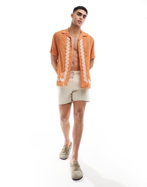 ASOS DESIGN - Chemise à revers décontractée avec bordure à broderies