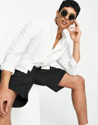 ASOS DESIGN - Chemise coupe décontractée en lin avec col boutonné - Blanc