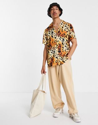 Chemises Chemise décontractée avec col à revers en satin imprimé léopard