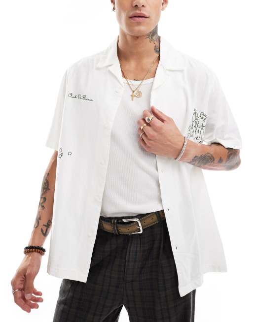 ASOS DESIGN - Chemise décontractée avec col à revers et imprimés sur le devant - Blanc