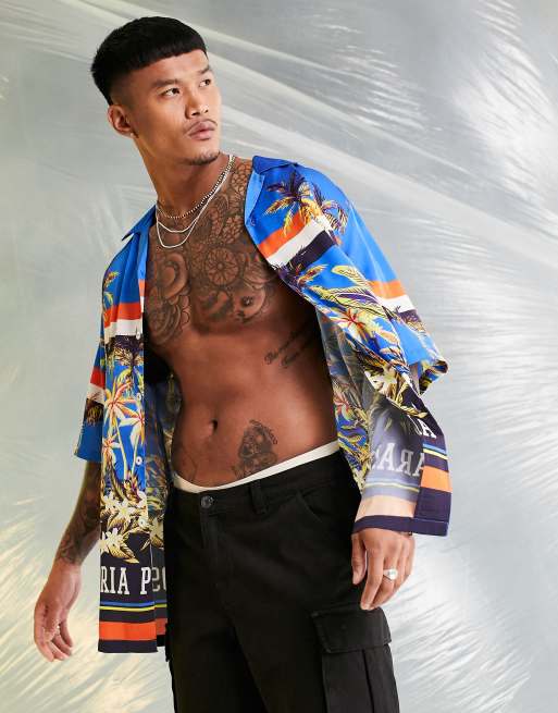 ASOS DESIGN - Chemise décontractée en satin avec col à revers et bords à fleurs