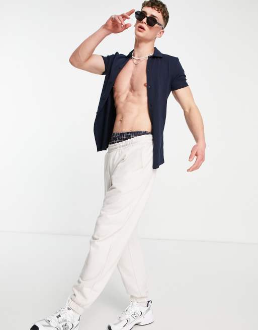 ASOS DESIGN - Chemise moulante en jersey de coton - Bleu marine - NAVY