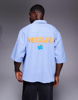 ASOS DESIGN - Chemise oversize à carreaux avec broderie au dos - Bleu