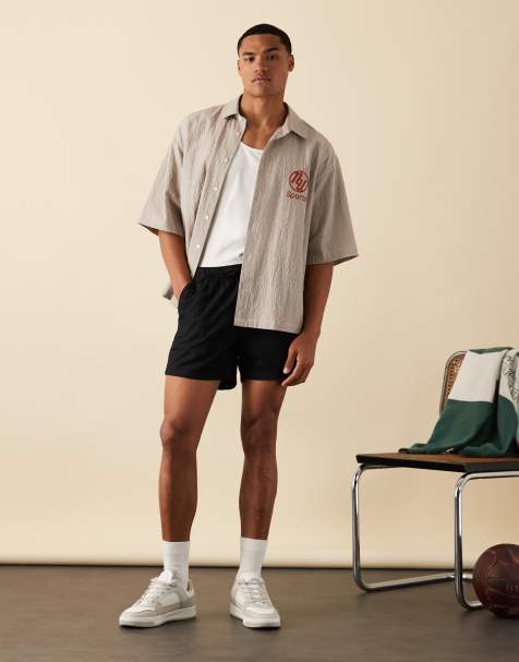 ASOS DESIGN - Chemise oversize coupe carrée à carreaux et broderie sur le devant - Marron - view 1