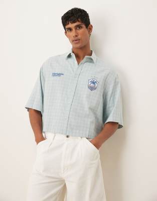 ASOS DESIGN - Chemise oversize raccourcie à carreaux - Bleu