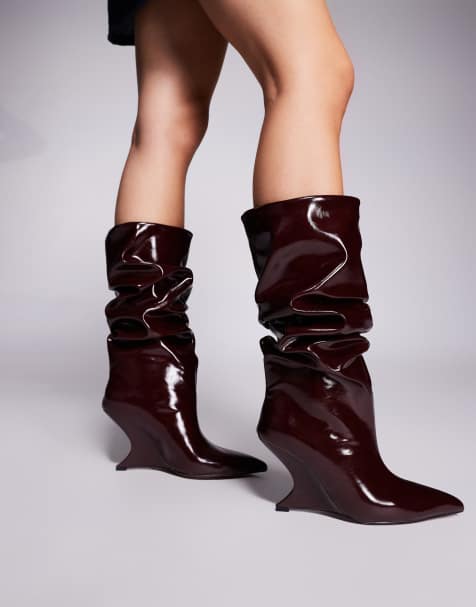 ASOS DESIGN – Cheryl – Kniehohe Stiefel in Burgunderrot mit Keilabsatz und weitem Schaft - view 1