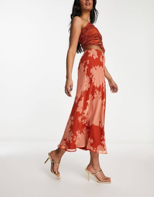 ASOS DESIGN chiffon bias midi skirt in orange floral 