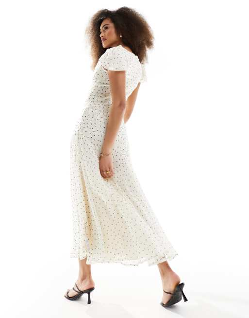 ASOS DESIGN chiffon cowl neck midi dress with puff sleeves and asymmetric hem in polka dot ASOS