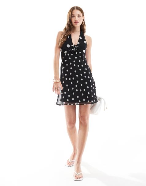 ASOS DESIGN chiffon halter mini dress with corsage detail in mixed spot print - view 1