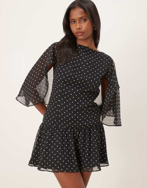 ASOS DESIGN – Chiffon-Minikleid in Schwarz mit Cape-Detail und Polka Dots - view 1