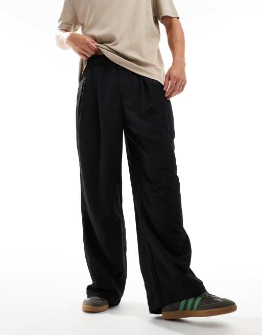 ASOS DESIGN - Chino oversize extra ampi con pieghe neri