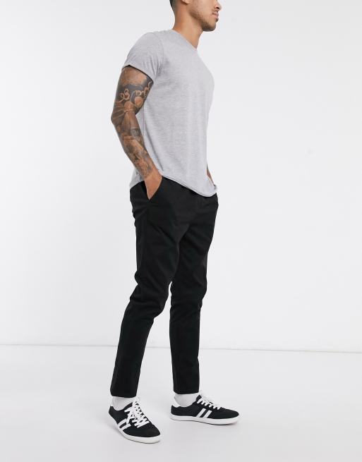 ASOS DESIGN - Chino slim neri con elastico in vita