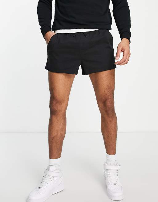 ASOS DESIGN - Chino taglio corto slim neri con vita elasticizzata