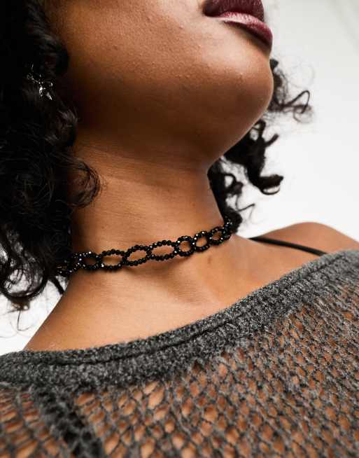 ASOS DESIGN choker necklace with wide velvet design in black