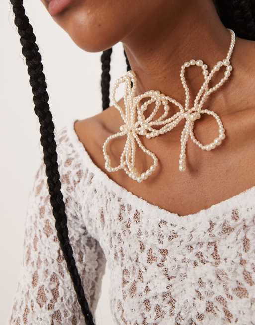 ASOS DESIGN choker necklace with faux pearl flowers, 2 of 3