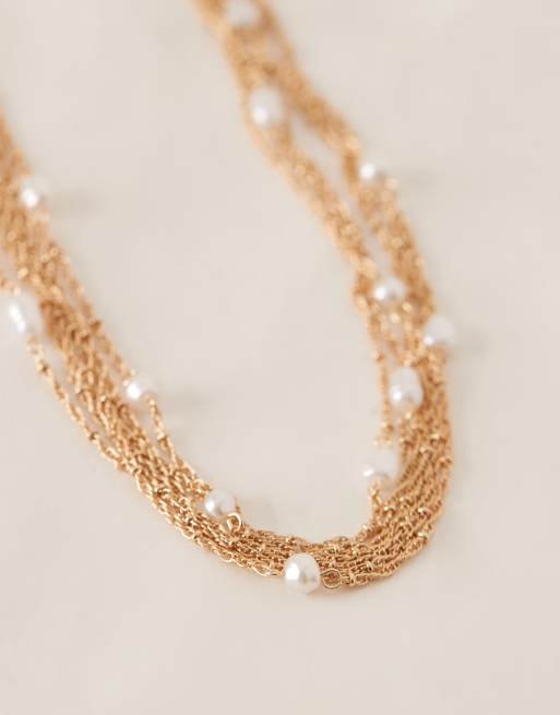 ASOS DESIGN choker necklace with multi-row chains and faux pearls in gold tone, 2 of 3