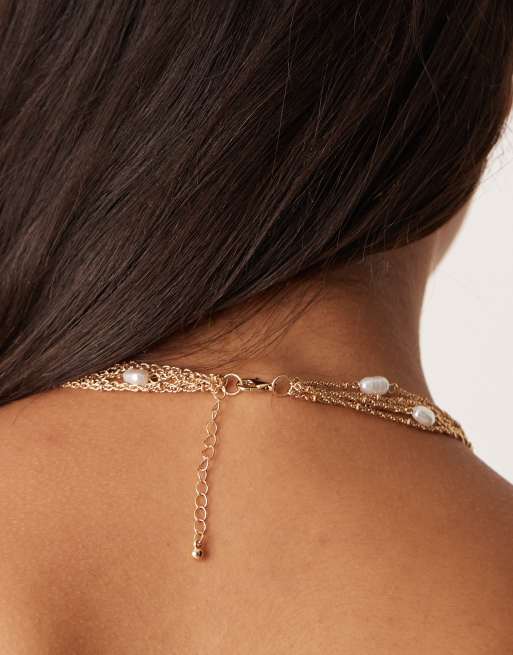 ASOS DESIGN choker necklace with multi-row chains and faux pearls in gold tone, 3 of 3