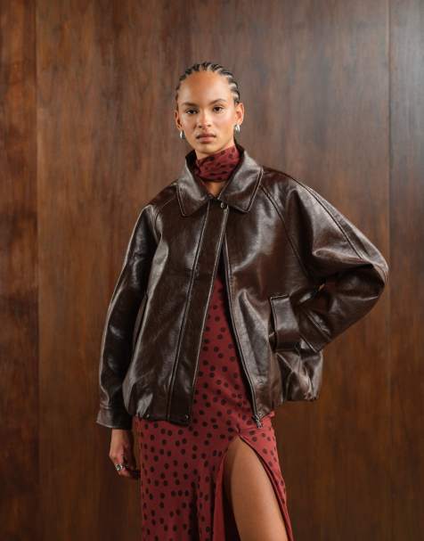 ASOS DESIGN – Chokladbrun bomberjacka i läderimitation och oversize - view 1