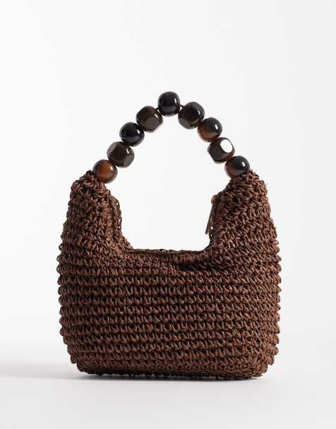 ASOS DESIGN – Chokladbrun handväska i strå med kulor i harts - view 1