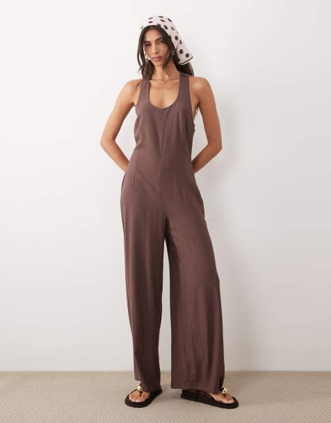 ASOS DESIGN – Chokladbrun jumpsuit med vida ben och snurrad knut baktill - view 1