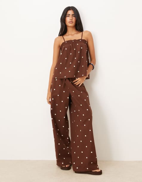 ASOS DESIGN – Chokladfärgade prickiga byxor i dra på-modell med vida ben - view 1