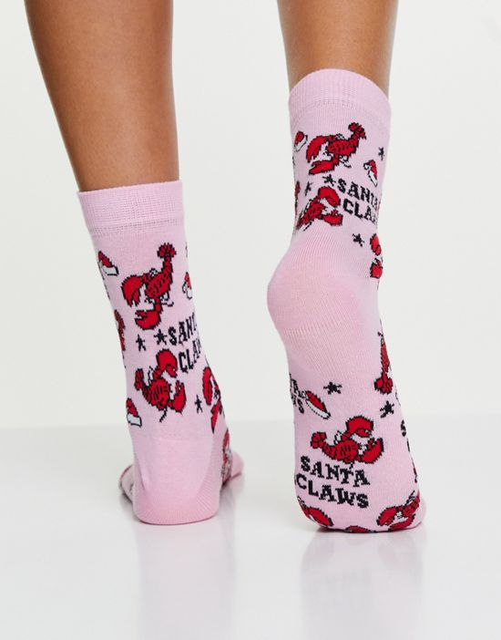 https://images.asos-media.com/products/asos-design-christmas-ankle-socks-in-santa-claws-print-in-pink/201136363-2?$n_550w$&wid=550&fit=constrain