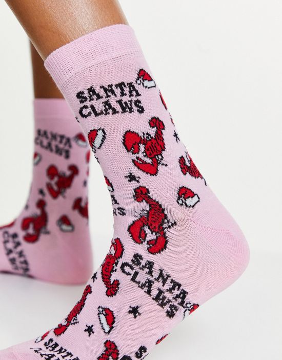 https://images.asos-media.com/products/asos-design-christmas-ankle-socks-in-santa-claws-print-in-pink/201136363-3?$n_550w$&wid=550&fit=constrain
