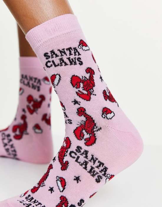https://images.asos-media.com/products/asos-design-christmas-ankle-socks-in-santa-claws-print-in-pink/201136363-3?$n_550w$&wid=550&fit=constrain
