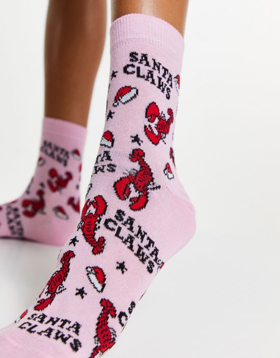 https://images.asos-media.com/products/asos-design-christmas-ankle-socks-in-santa-claws-print-in-pink/201136363-4?$n_550w$&wid=550&fit=constrain