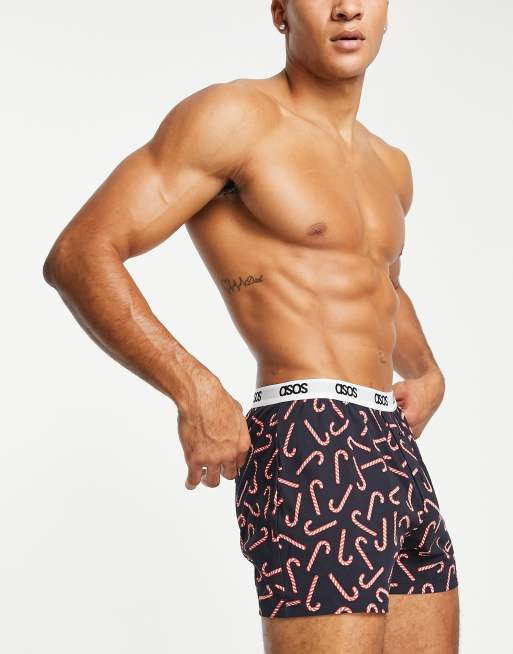 ASOS DESIGN christmas short trunks with candy cane print