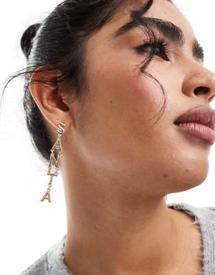 ASOS DESIGN ASOS DESIGN Christmas drop earrings with Santa Baby drop detail in gold tone