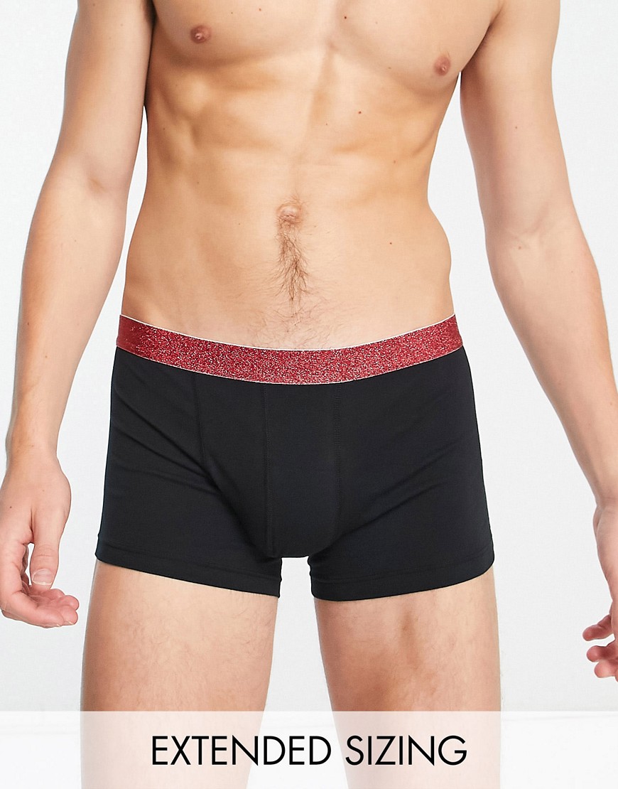 ASOS DESIGN Christmas jersey trunks in black with red glitter waistband
