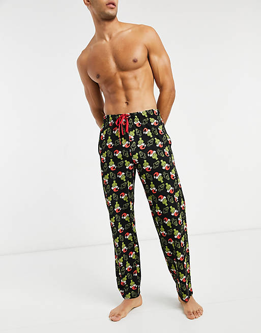 ASOS DESIGN christmas lounge pyjama bottoms with The Grinch print