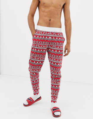 ASOS DESIGN Christmas mr & mrs pyjama set with mistletoe design