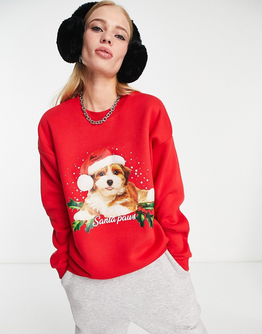 ASOS DESIGN Christmas oversized sweatshirt with santa paws print in bright red