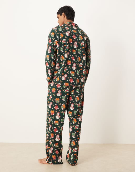 ASOS DESIGN Christmas pajama set with characters graphic in green